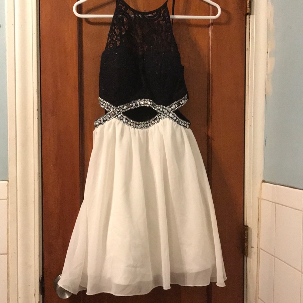 White and black lace dress with belt cut out full of diamonds